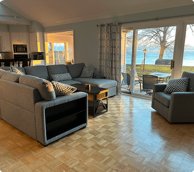 Living Room with Large Windows Overlooking the Lake