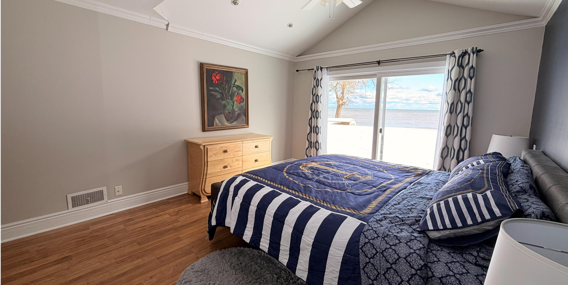 Master Bedroom with large windows overlooking Lake Michigan